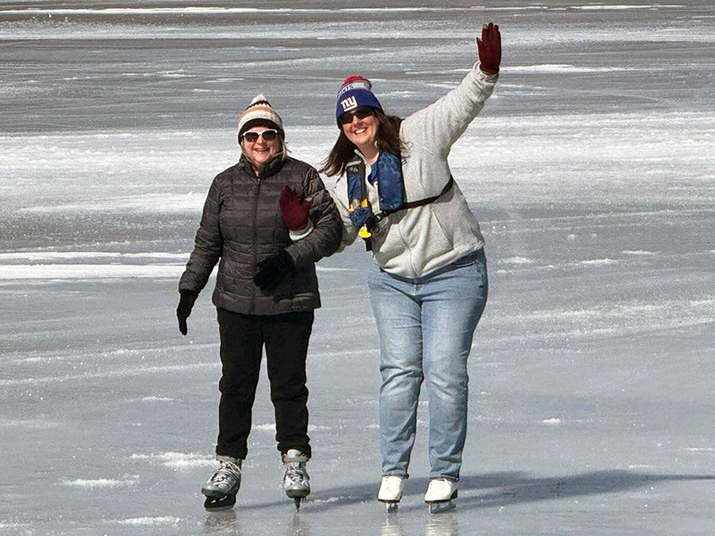 Donna and Cait skate on the Lake.