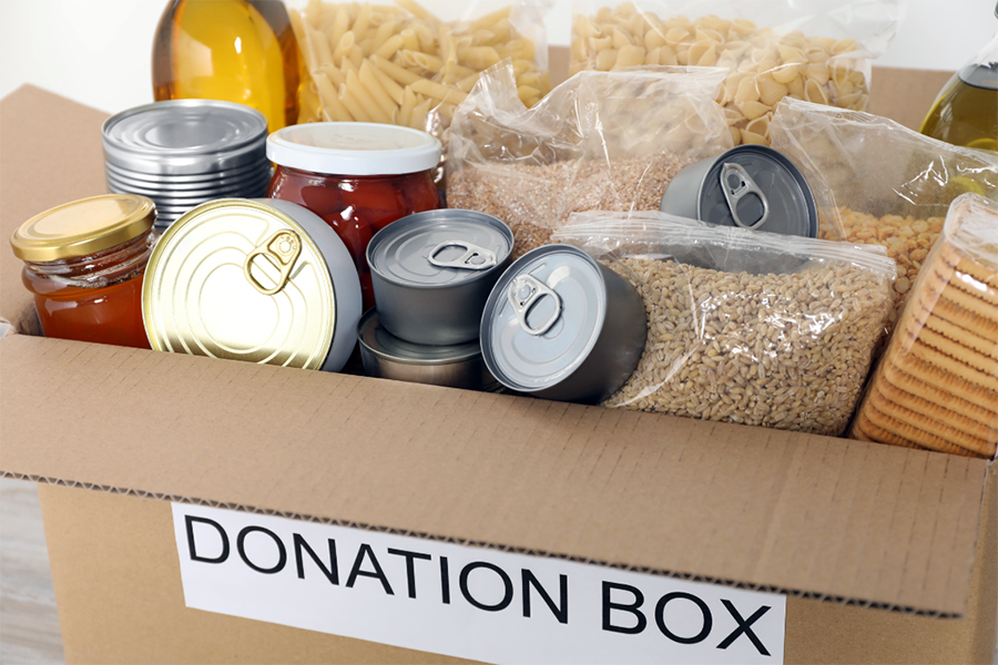 Non-perishable foods sit in a bin.